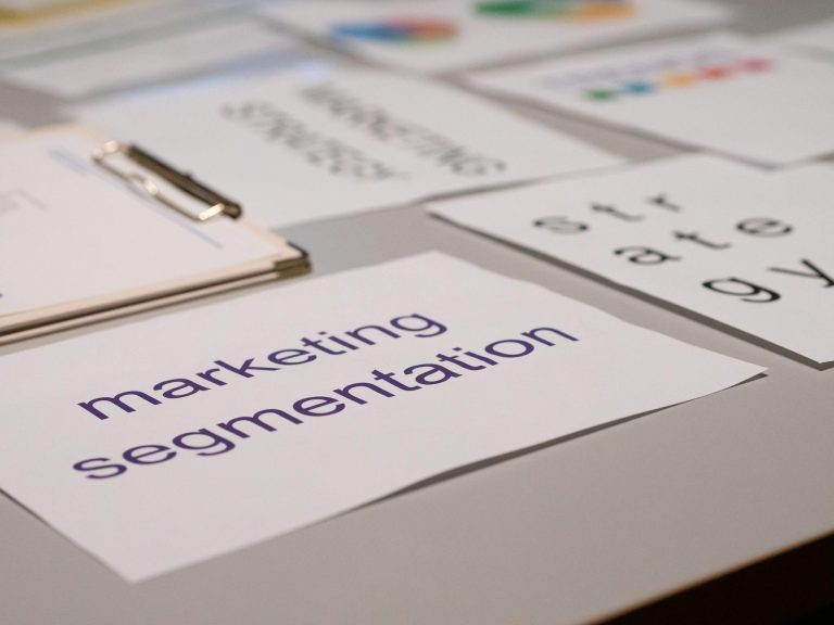 Close-up of various marketing documents on a desk, perfect for business and strategy discussions.