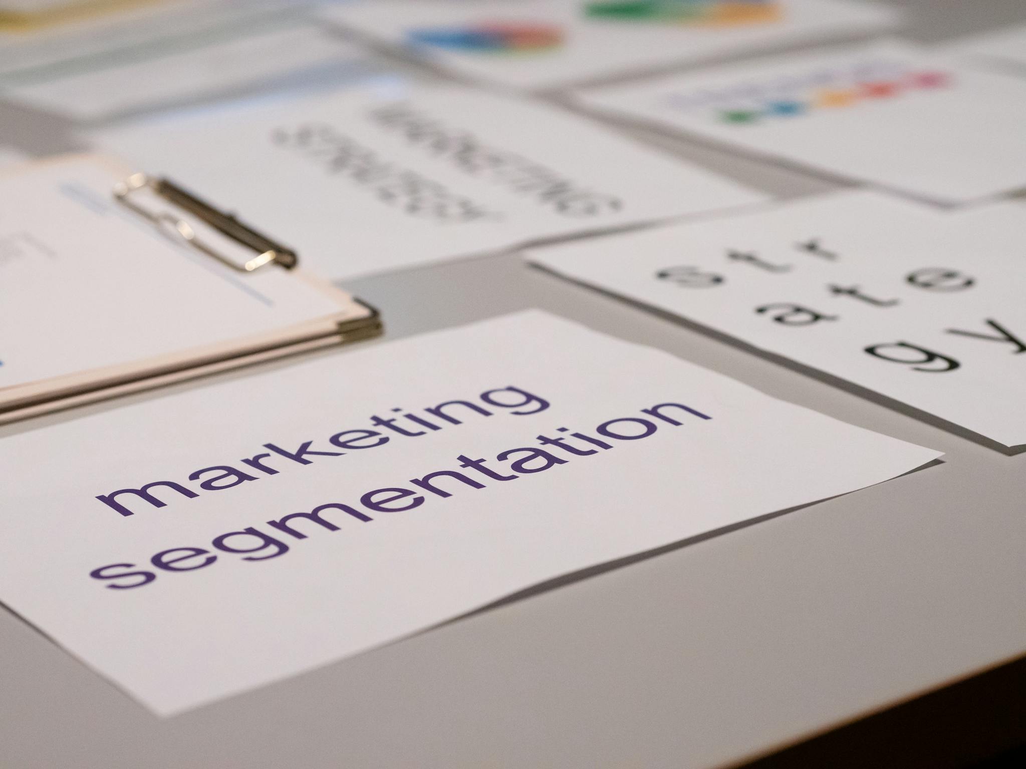 Close-up of various marketing documents on a desk, perfect for business and strategy discussions.
